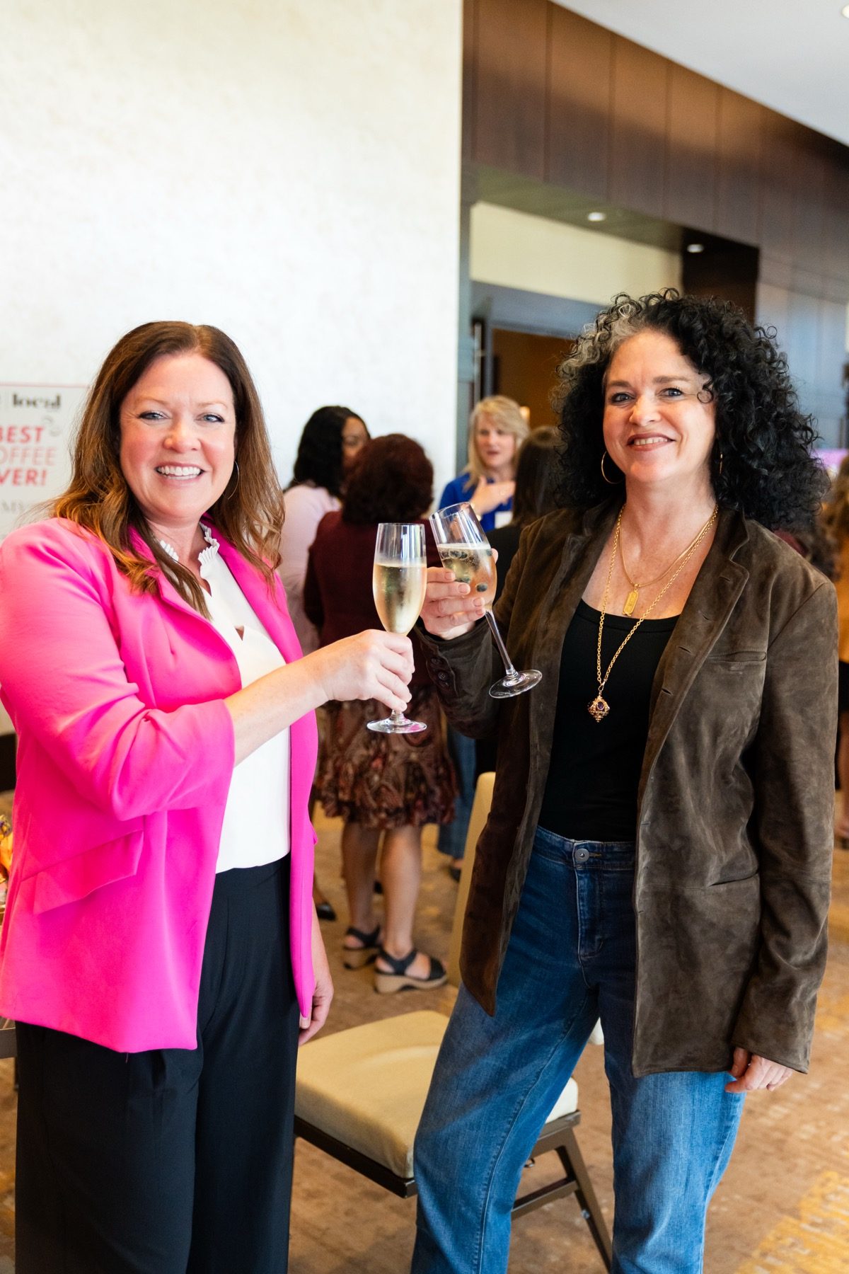 Two local business owners connecting at a North Texas community event